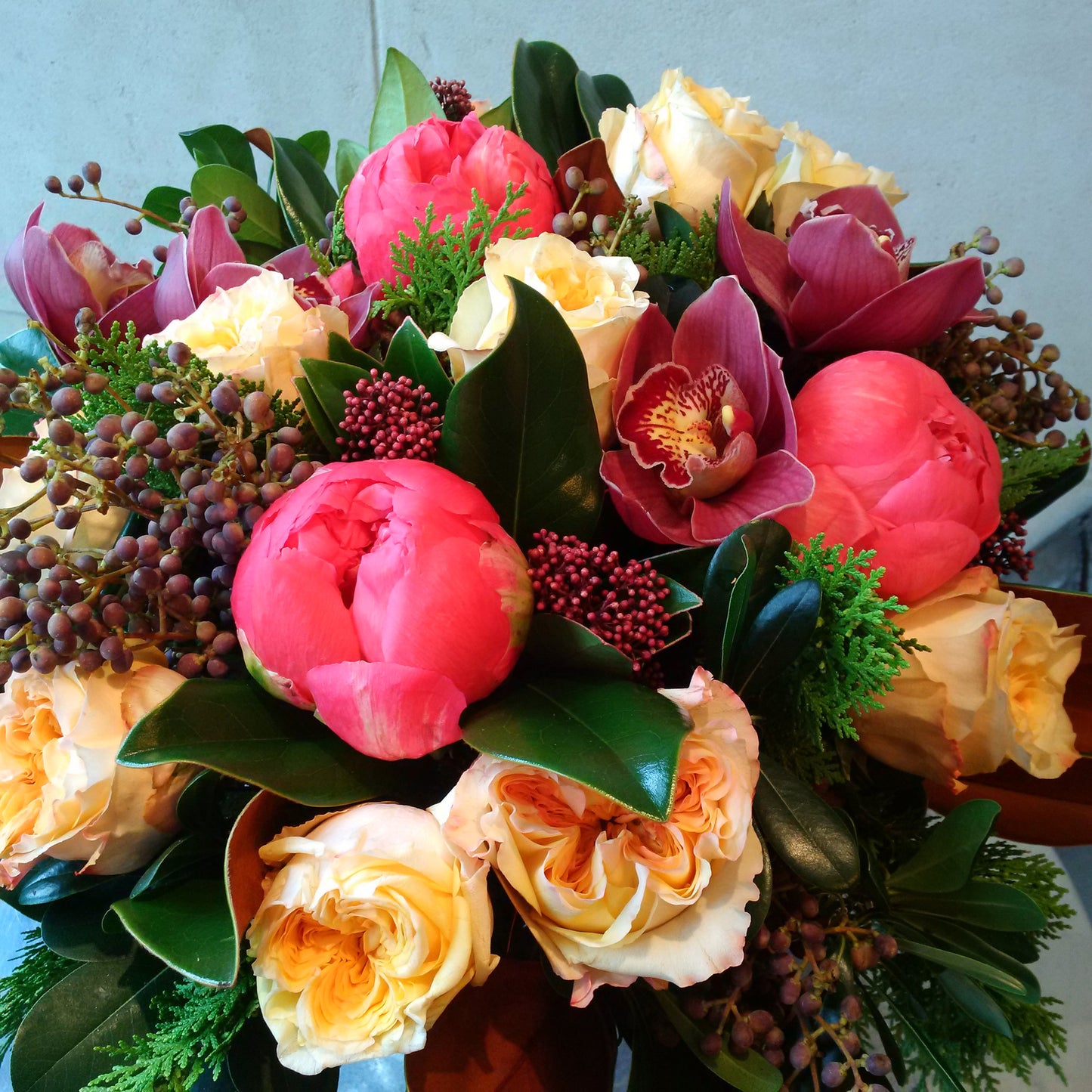 Holiday delight arrangement in glass compote